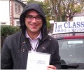 Oleg with Driving test pass certificate